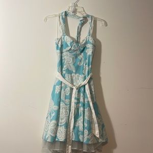 Coastal themed blue teal white dress with waist tie and adjustable halter top.